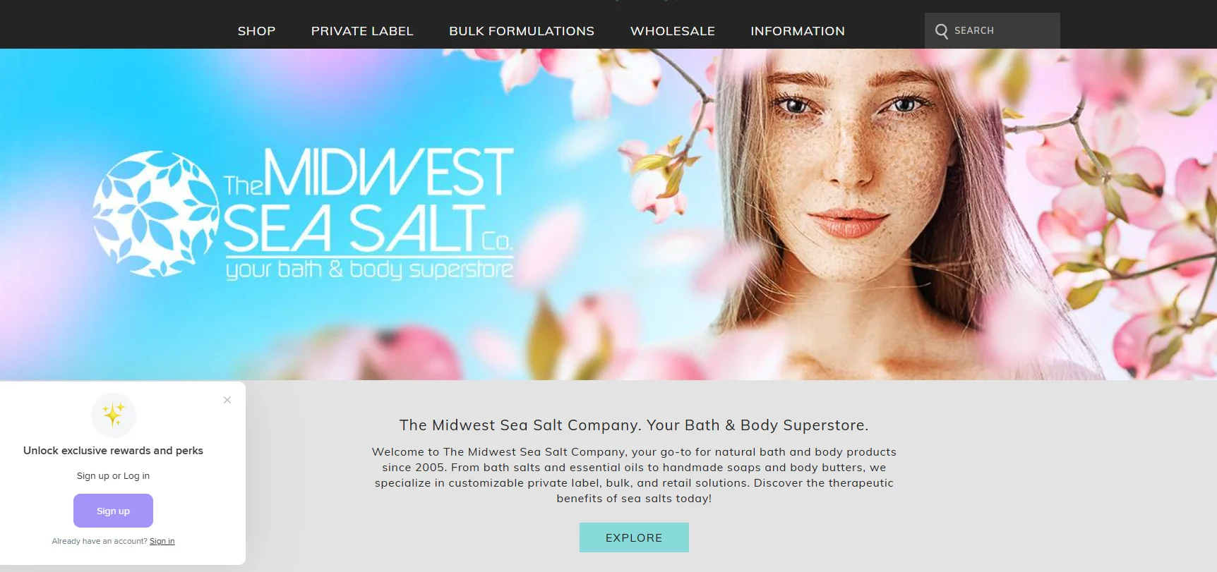 Website banner for Midwest Sea Salt Company featuring floral design and company description.